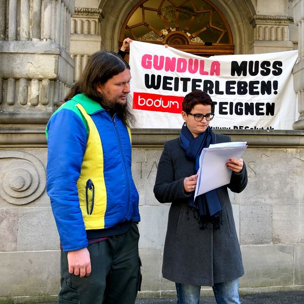 Aktivist muss wegen «Bodum»-Plakat bei Polizei antraben